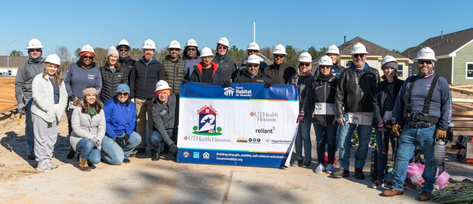 Physicians and staff braved the cold temperatures on Jan. 17 to kick off day one of building a new home with Houston Habitat for Humanity. (Photo by Kim Kham/UT Physicians)